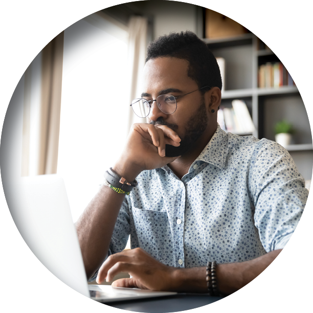 serious businessman working on laptop